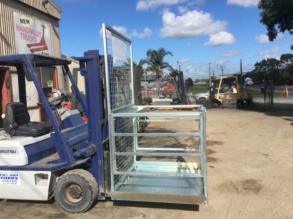 Forklift with safety cage